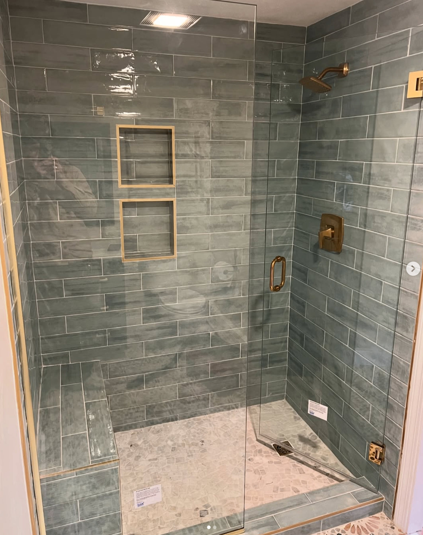 Custom Teal Tile Shower with 
Brass Fixtures
